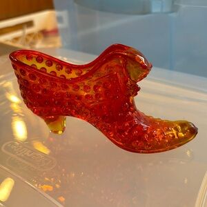 Vintage orange glass high heel shoe.